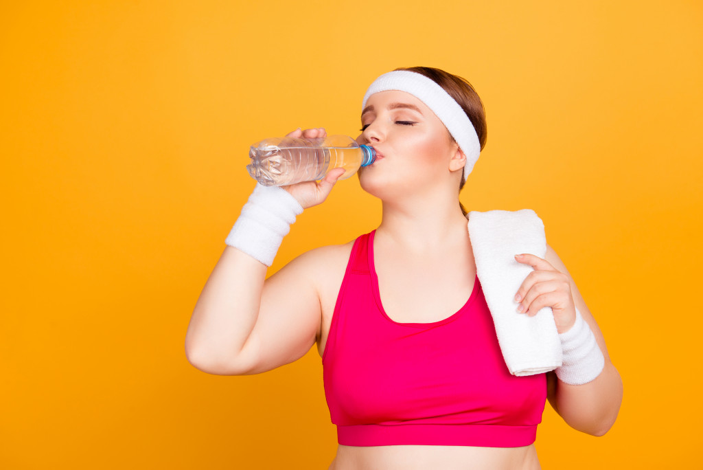 a woman drinking water