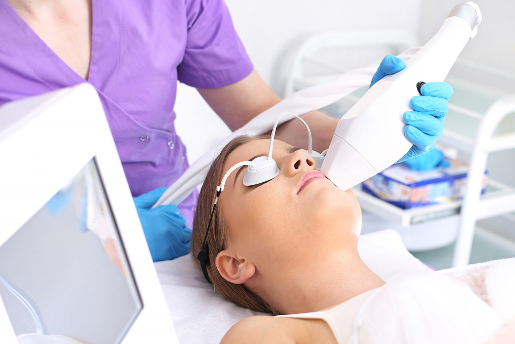 woman getting facial treatment