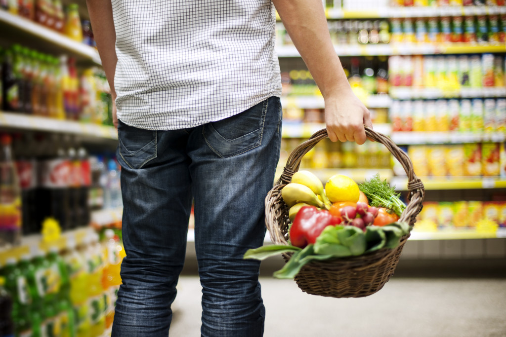 man buying fruits and vegetables