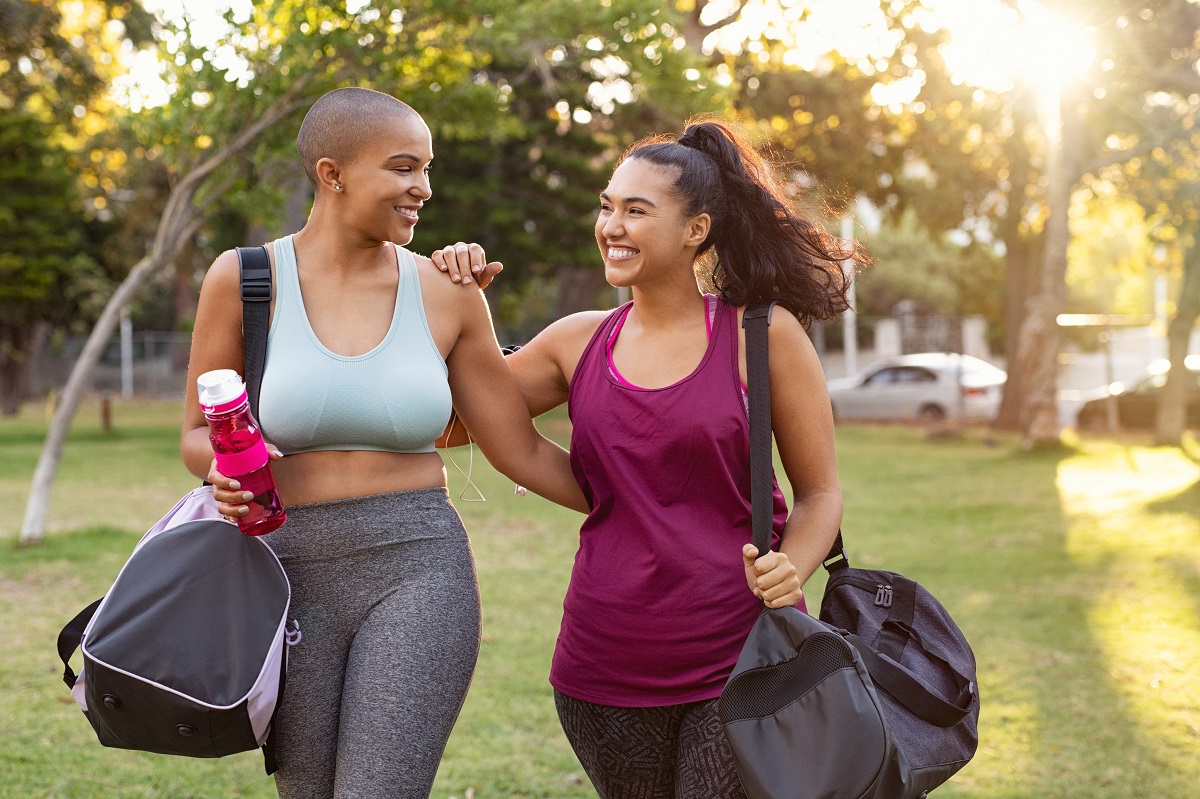 two woman walking