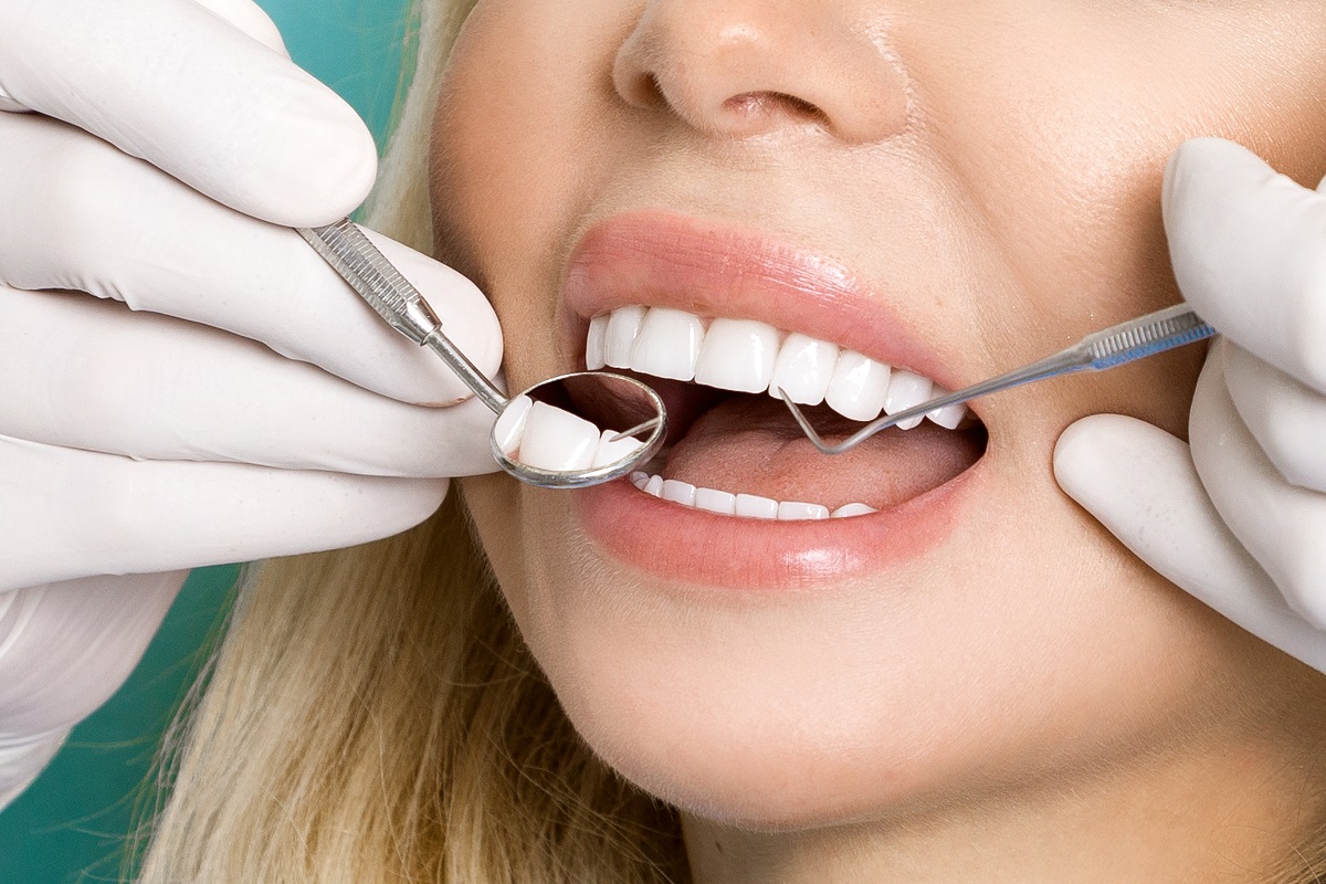 young woman getting her teeth checked