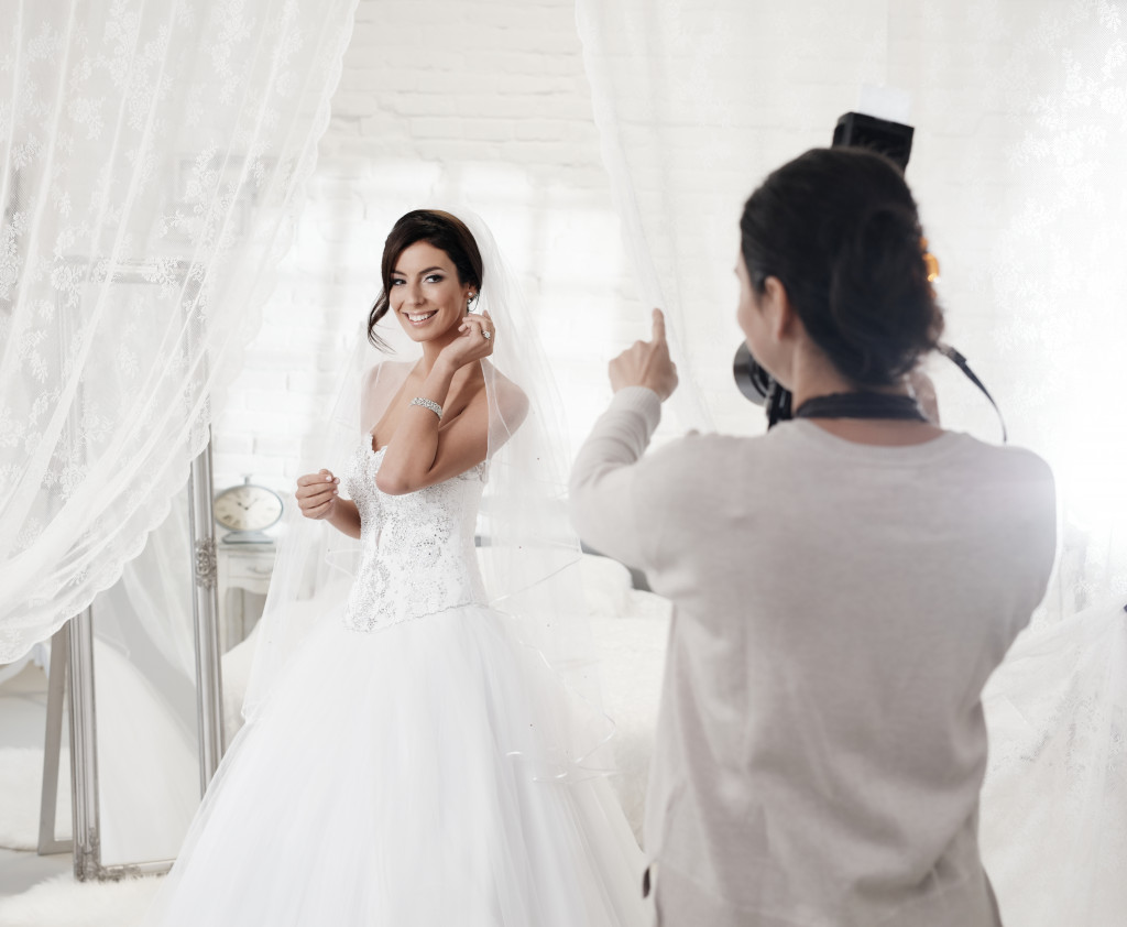 A wedding photography taking pictures of the bride