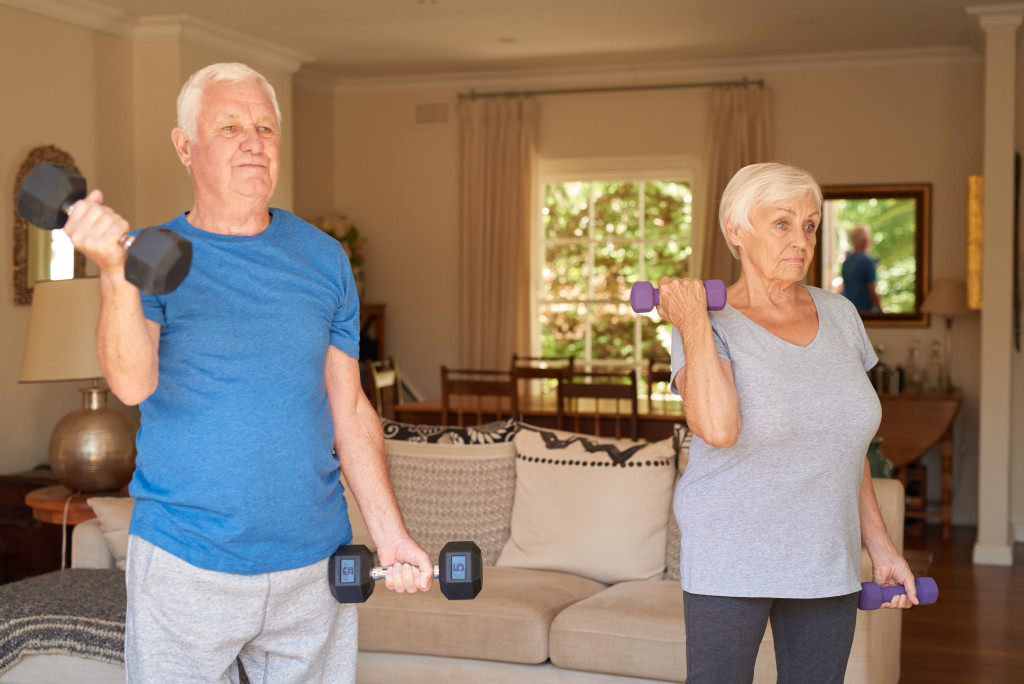 A senior couple working out together